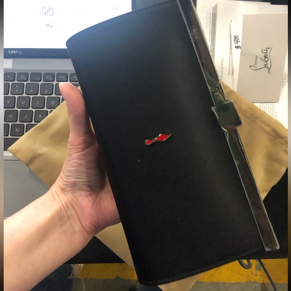Palmette Chrustian Louboutin clutch.
 Authentic!